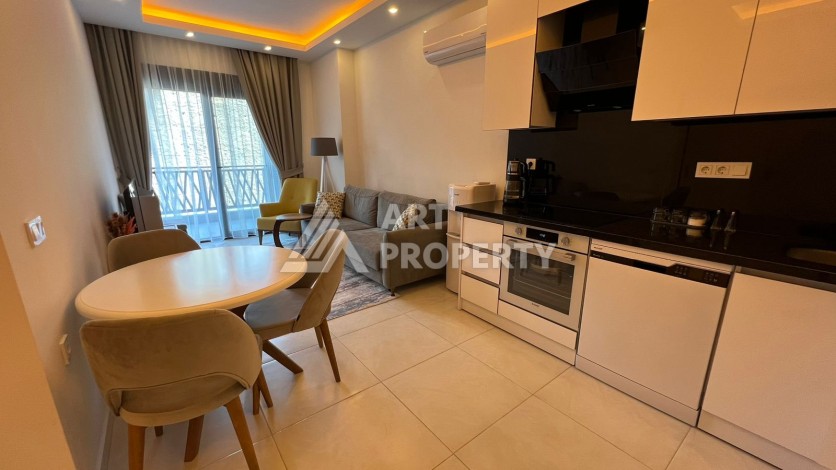 Меблированная квартира 1+1 в престижной резиденции, 55 кв.м. в Махмутларе - Ракурс 12