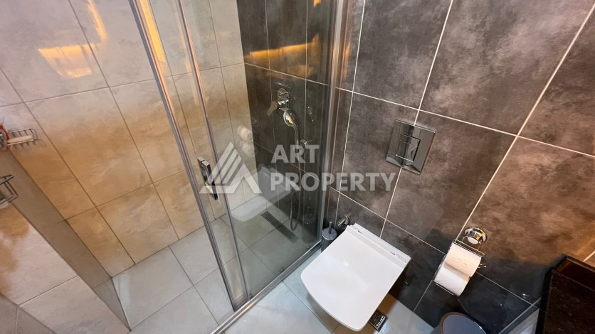 Меблированная квартира 1+1 в престижной резиденции, 55 кв.м. в Махмутларе - Ракурс 16