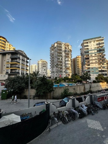 Квартира 1+1 в резиденции отельного типа в Махмутларе, 55 кв.м. - Ракурс 9