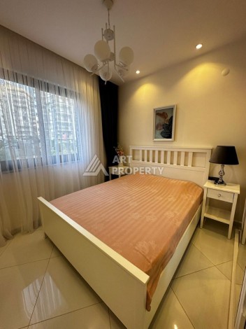 Квартира 1+1 в резиденции отельного типа в Махмутларе, 55 кв.м. - Ракурс 12