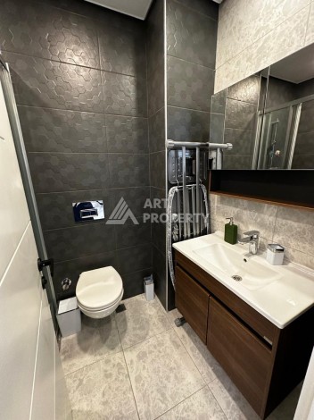 Квартира 1+1 в резиденции отельного типа в Махмутларе, 55 кв.м. - Ракурс 19