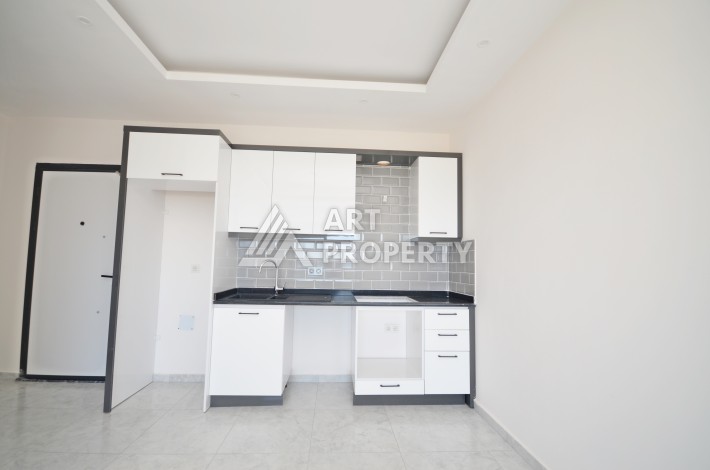 Квартира 1+1 с видом на море и лес в Авсалларе, 55 кв.м. - Ракурс 9