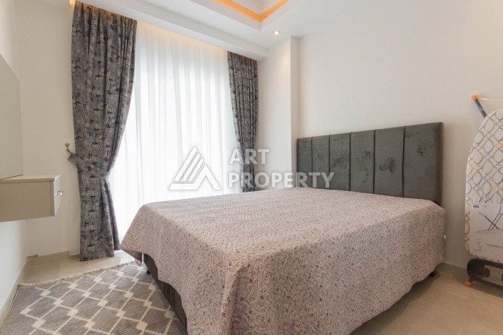 Квартира 1+1 люкс класса в Махмутларе, 55 кв.м. - Ракурс 11