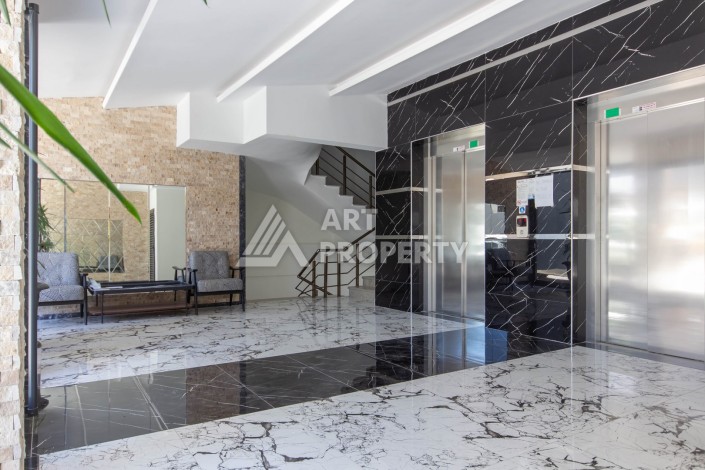 Просторная квартира 1+1 в современном комплексе, 67 кв.м. в Махмутларе. - Ракурс 9