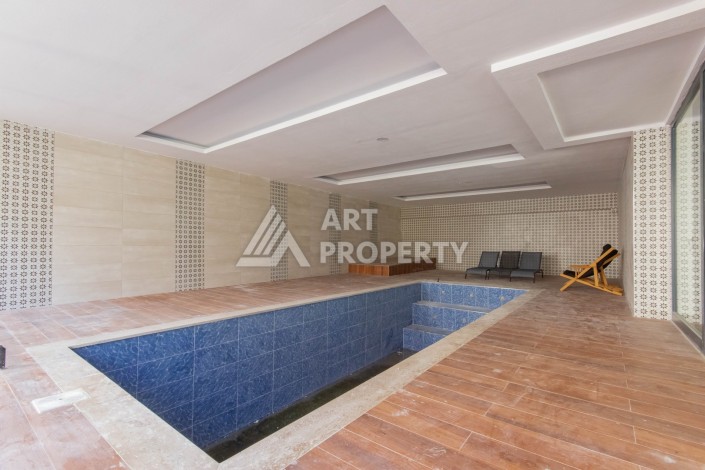 Просторная квартира 1+1 в современном комплексе, 67 кв.м. в Махмутларе. - Ракурс 10