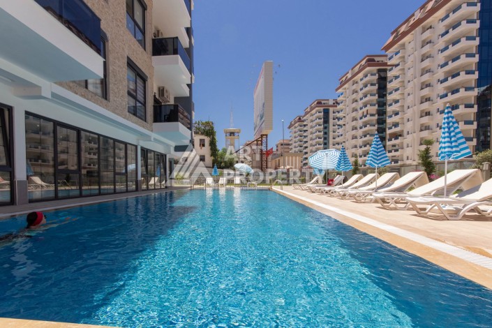 Просторная квартира 1+1 в современном комплексе, 67 кв.м. в Махмутларе. - Ракурс 14