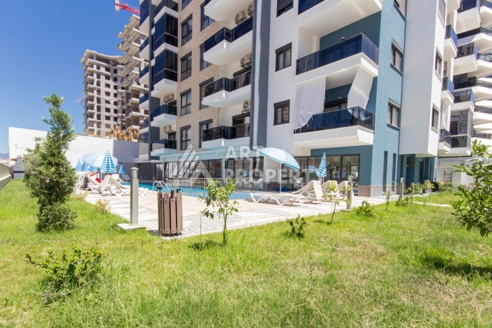 Просторная квартира 1+1 в современном комплексе, 67 кв.м. в Махмутларе. - Ракурс 18