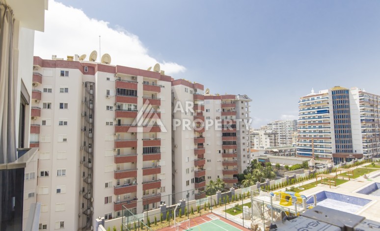 Просторная квартира 1+1 в современном комплексе, 67 кв.м. в Махмутларе. - Ракурс 20