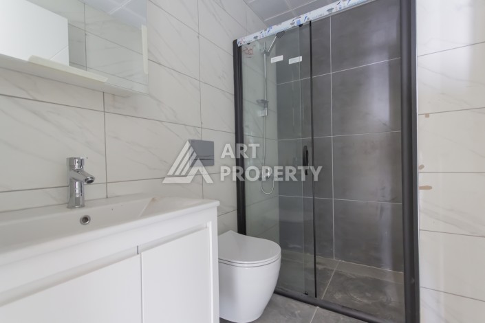 Просторная квартира 1+1 в современном комплексе, 67 кв.м. в Махмутларе. - Ракурс 27