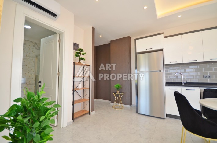 Роскошная квартира 1+1 в районе Авсаллар с видом на море, 55 кв.м. - Ракурс 10