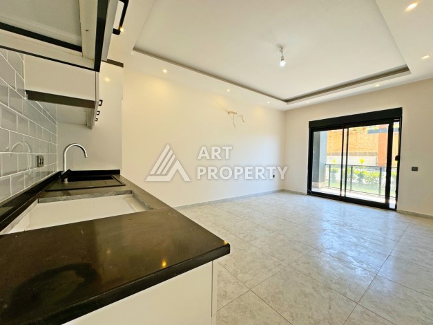 Квартира 1+1 с выходом в сад, 57 кв.м. в Авсалларе - Ракурс 14