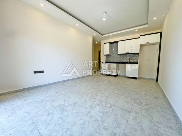 Квартира 1+1 с выходом в сад, 57 кв.м. в Авсалларе - Ракурс 17