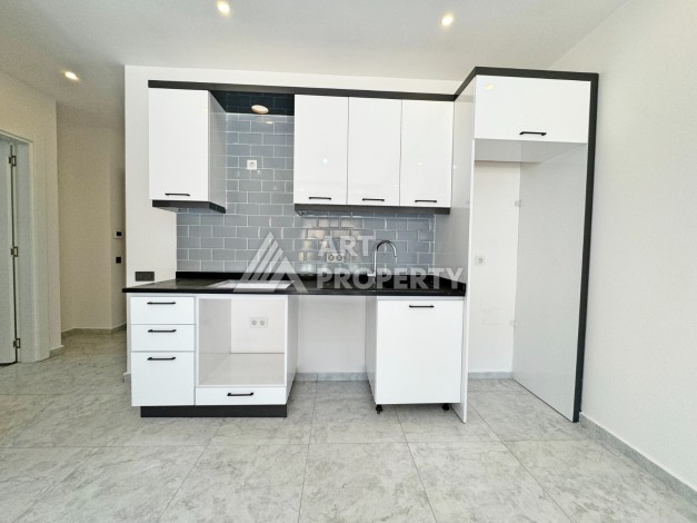 Квартира 1+1 с выходом в сад, 57 кв.м. в Авсалларе - Ракурс 20