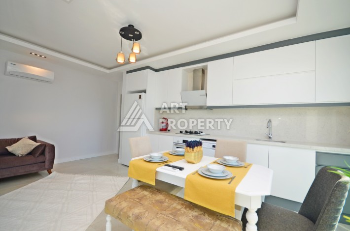 Квартира 2+1 с видом на море в Махмутларе, 80 кв.м. - Ракурс 4