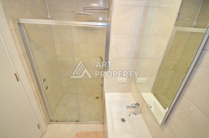 Квартира 2+1 с видом на море в Махмутларе, 80 кв.м. - Ракурс 8