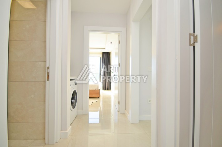 Квартира 2+1 с видом на море в Махмутларе, 80 кв.м. - Ракурс 9