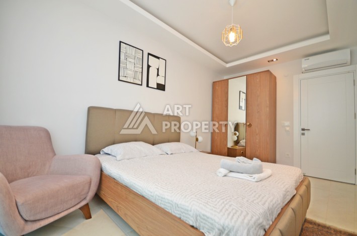 Квартира 2+1 с видом на море в Махмутларе, 80 кв.м. - Ракурс 11