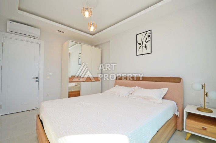 Квартира 2+1 с видом на море в Махмутларе, 80 кв.м. - Ракурс 13