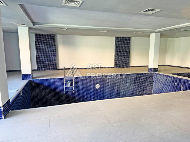 Квартира 2+1 с видом на море в Махмутларе, 80 кв.м. - Ракурс 21