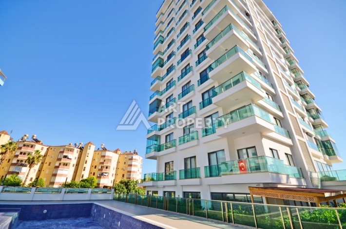 Квартира 2+1 с видом на море в Махмутларе, 80 кв.м. - Ракурс 27