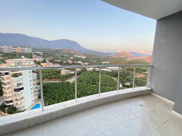 Двухкомнатная квартира с шикарным видом на Торосские горы, Махмутлар, Алания, 50 м2 - Ракурс 2