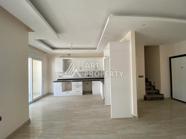 Дуплекс 2+1 в центре Махмутлара, 120 кв.м. Новый ЖК. - Ракурс 2