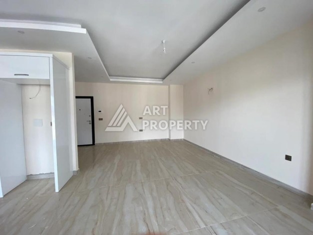 Дуплекс 2+1 в центре Махмутлара, 120 кв.м. Новый ЖК. - Ракурс 3