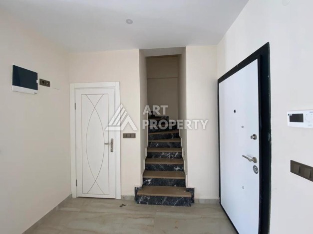 Дуплекс 2+1 в центре Махмутлара, 120 кв.м. Новый ЖК. - Ракурс 5