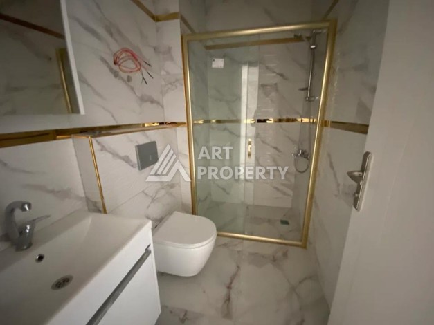 Дуплекс 2+1 в центре Махмутлара, 120 кв.м. Новый ЖК. - Ракурс 9