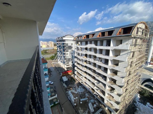 Дуплекс 2+1 в центре Махмутлара, 120 кв.м. Новый ЖК. - Ракурс 13