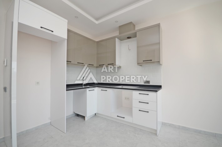 Квартира 1+1 в престижном комплексе, 46 кв.м. Авсаллар, Алания - Ракурс 16