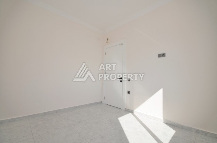 Квартира 1+1 в престижном комплексе, 46 кв.м. Авсаллар, Алания - Ракурс 18
