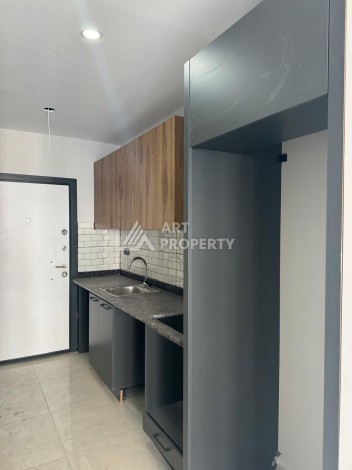 Квартира 1+1 в центре Махмутлара, 40 кв.м. - Ракурс 4