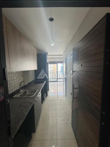 Квартира 1+1 в центре Махмутлара, 40 кв.м. - Ракурс 5