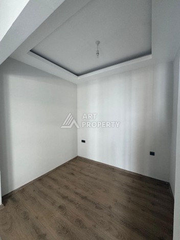 Квартира 1+1 в центре Махмутлара, 40 кв.м. - Ракурс 7