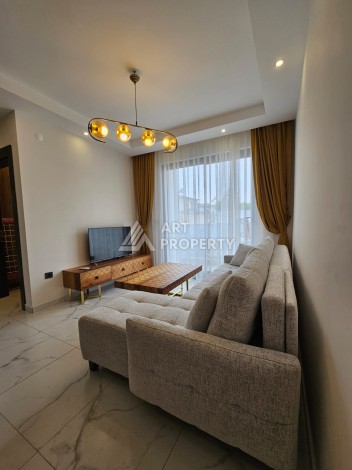 Меблированная квартира 1+1 в новой резиденции, 55 кв.м. в Махмутларе. - Ракурс 3