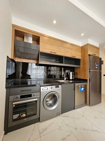 Меблированная квартира 1+1 в новой резиденции, 55 кв.м. в Махмутларе. - Ракурс 8