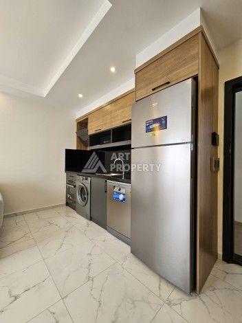 Меблированная квартира 1+1 в новой резиденции, 55 кв.м. в Махмутларе. - Ракурс 9