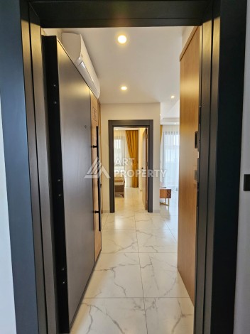 Меблированная квартира 1+1 в новой резиденции, 55 кв.м. в Махмутларе. - Ракурс 10