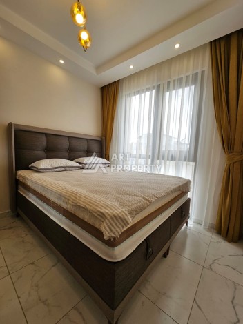 Меблированная квартира 1+1 в новой резиденции, 55 кв.м. в Махмутларе. - Ракурс 13