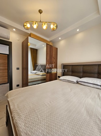 Меблированная квартира 1+1 в новой резиденции, 55 кв.м. в Махмутларе. - Ракурс 15