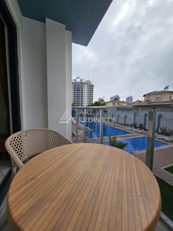 Меблированная квартира 1+1 в новой резиденции, 55 кв.м. в Махмутларе. - Ракурс 21