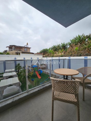 Меблированная квартира 1+1 в новой резиденции, 55 кв.м. в Махмутларе. - Ракурс 24