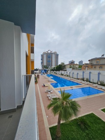 Меблированная квартира 1+1 в новой резиденции, 55 кв.м. в Махмутларе. - Ракурс 25