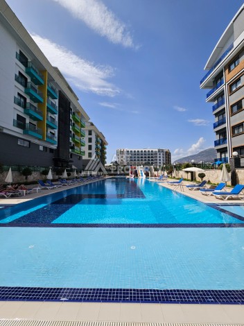 Квартира 1+1 люкс класса в 100 метрах от моря. Каргыджак, Алания. - Ракурс 25