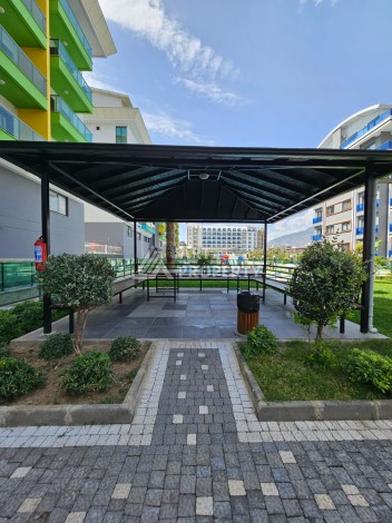 Квартира 1+1 люкс класса в 100 метрах от моря. Каргыджак, Алания. - Ракурс 32