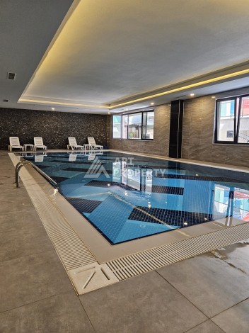 Квартира 1+1 люкс класса в 100 метрах от моря. Каргыджак, Алания. - Ракурс 46