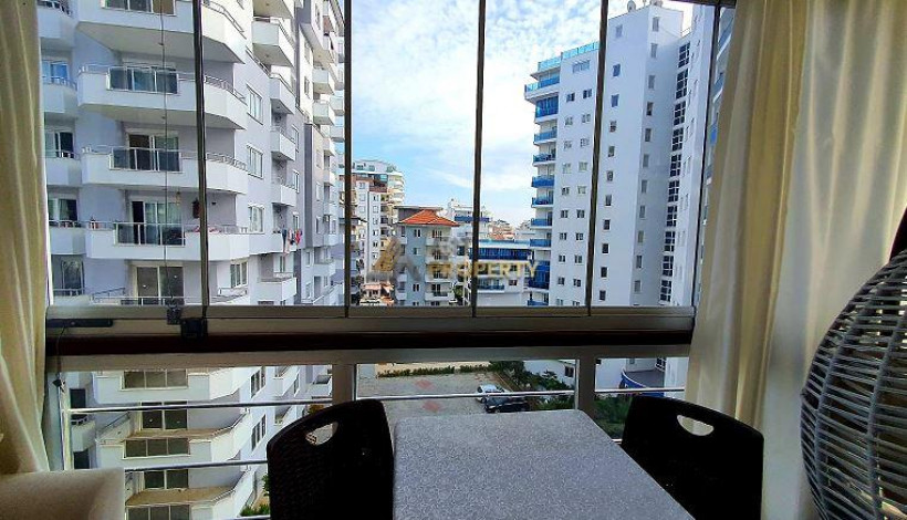 Двухкомнатная квартира в 250 метрах от моря в районе Махмутлар, 75 м2 - Ракурс 16