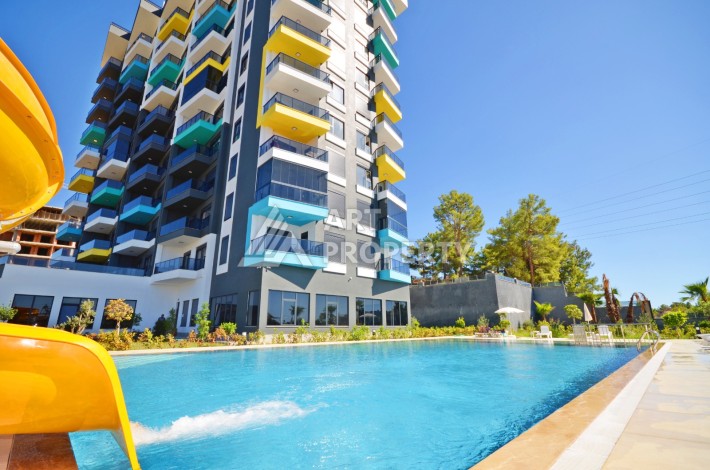 Видовая двухкомнатная квартира 55 кв.м. в новой резиденции. Авсаллар, Алания. - Ракурс 2