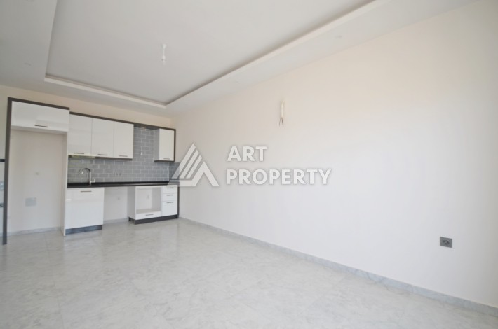 Видовая двухкомнатная квартира 55 кв.м. в новой резиденции. Авсаллар, Алания. - Ракурс 11